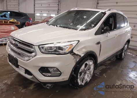 2017 Ford Escape Titanium z USA, uszkodzony, nr VIN 1FMCU9J93HUC69256